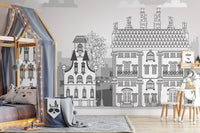 Playroom mural featuring colorful buildings in a town of imagination.

