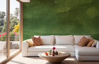 Elegant green mural featuring soft and harmonious tones in living area.
