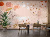 Modern dining room with a botanical abstract wall mural and green plants.