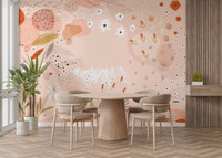 Sunlit dining area with neutral furniture and a floral art wall mural.