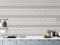 Kitchen counter with blue cabinets and horizontal boho pattern wall mural.
