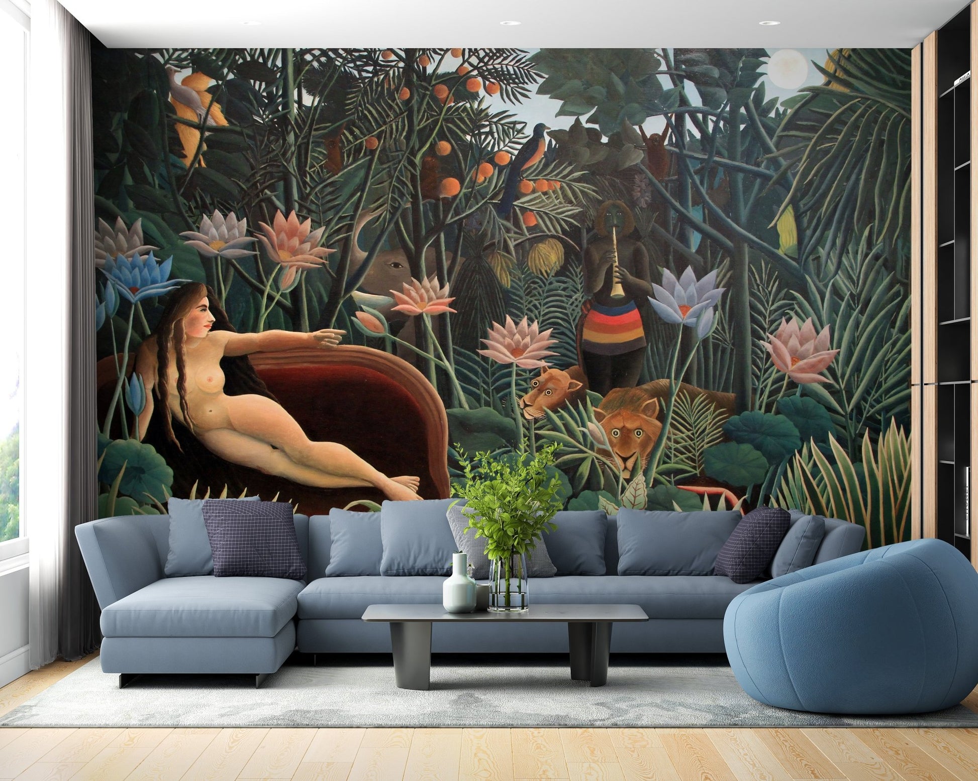 Blue sofa paired with a dark tropical vegetation art wall mural in a modern flat.