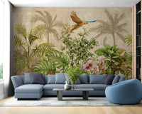 Blue sectional sofa in living room placed against a tropical forest wall mural.