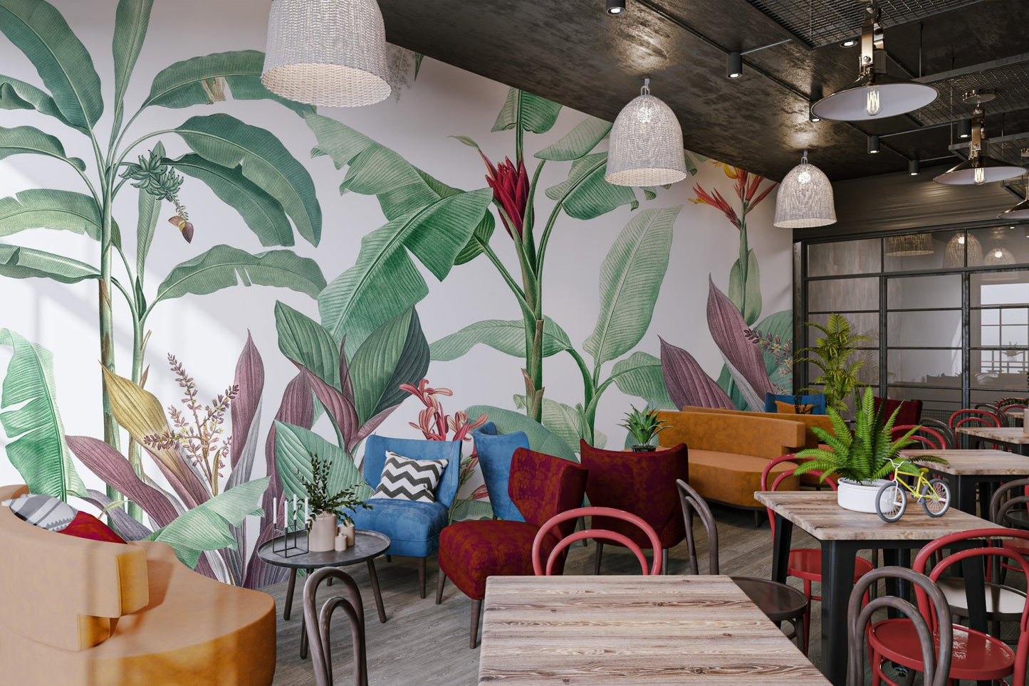 Tropical banana leaf wall mural for a bright modern cafe area.