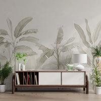 Neutral-toned tropical mural with large banana leaves and foliage elements.
