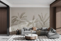 Beige banana leaf mural creating a calm tropical backdrop for living room.