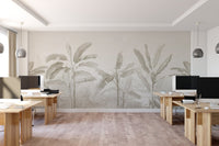 Tropical banana leaf wall mural with soft beige tones for a serene office interior.