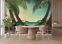 Round wooden dining table set against a coastal beach wallpaper mural scene.