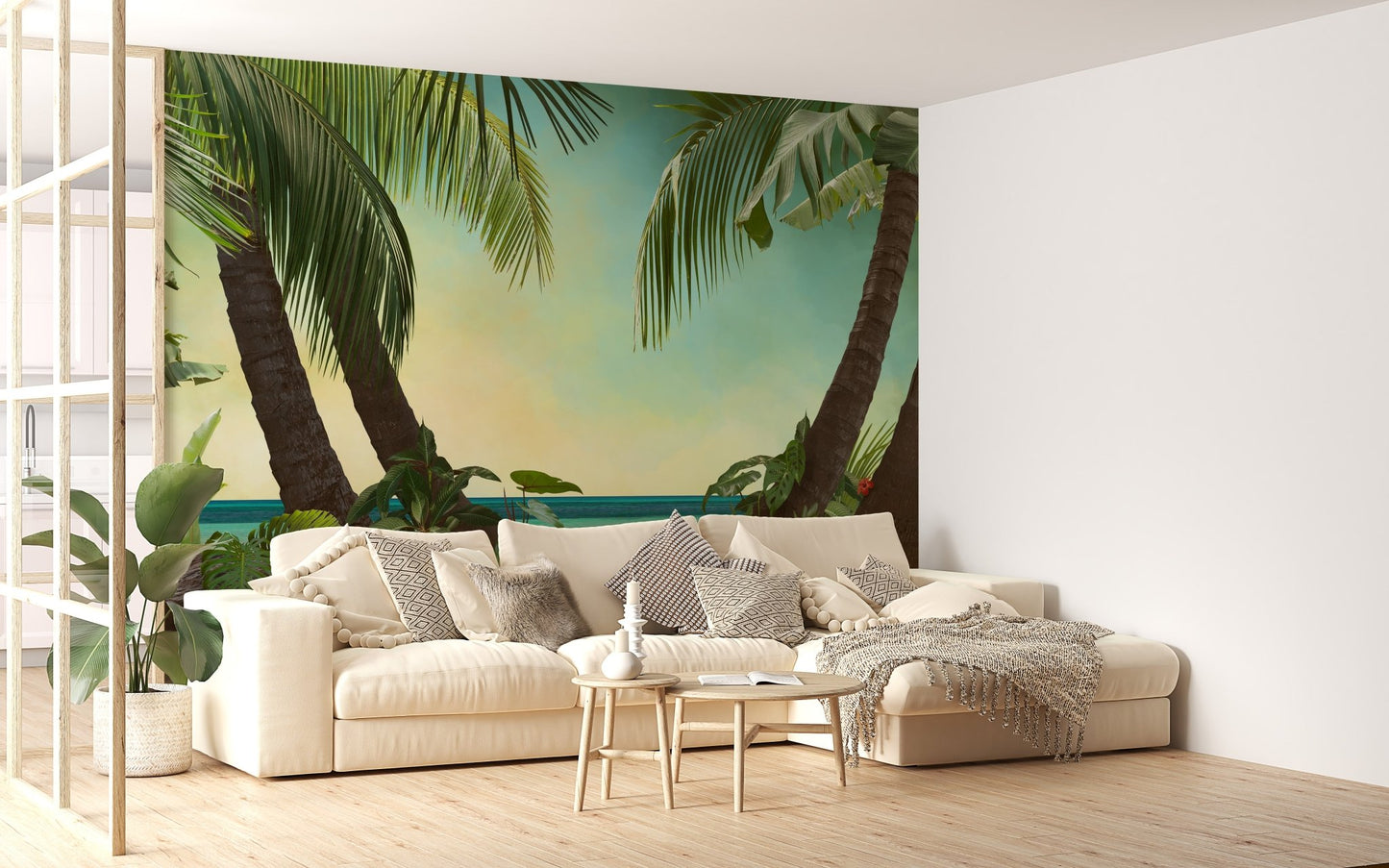 Bright living room decorated with Tropical Beach View Wallpaper Murals and green plants.