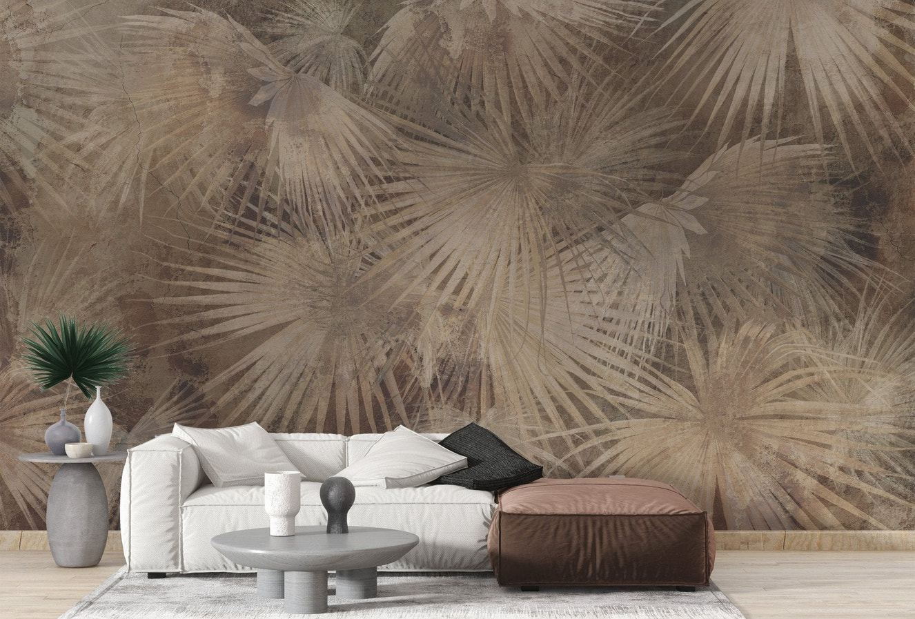 Abstract tropical leaf wallpaper with distressed brown finish.