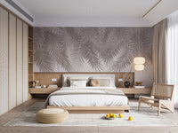 Minimal tropical leaf wallpaper mural in warm neutral color.
