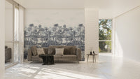 Large blue palm tree wall mural in a bright open plan living area.