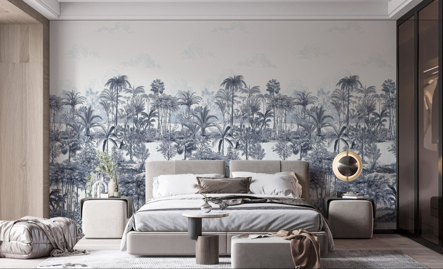 Detailed blue forest leaf wall mural in a modern bedroom with grey bed.