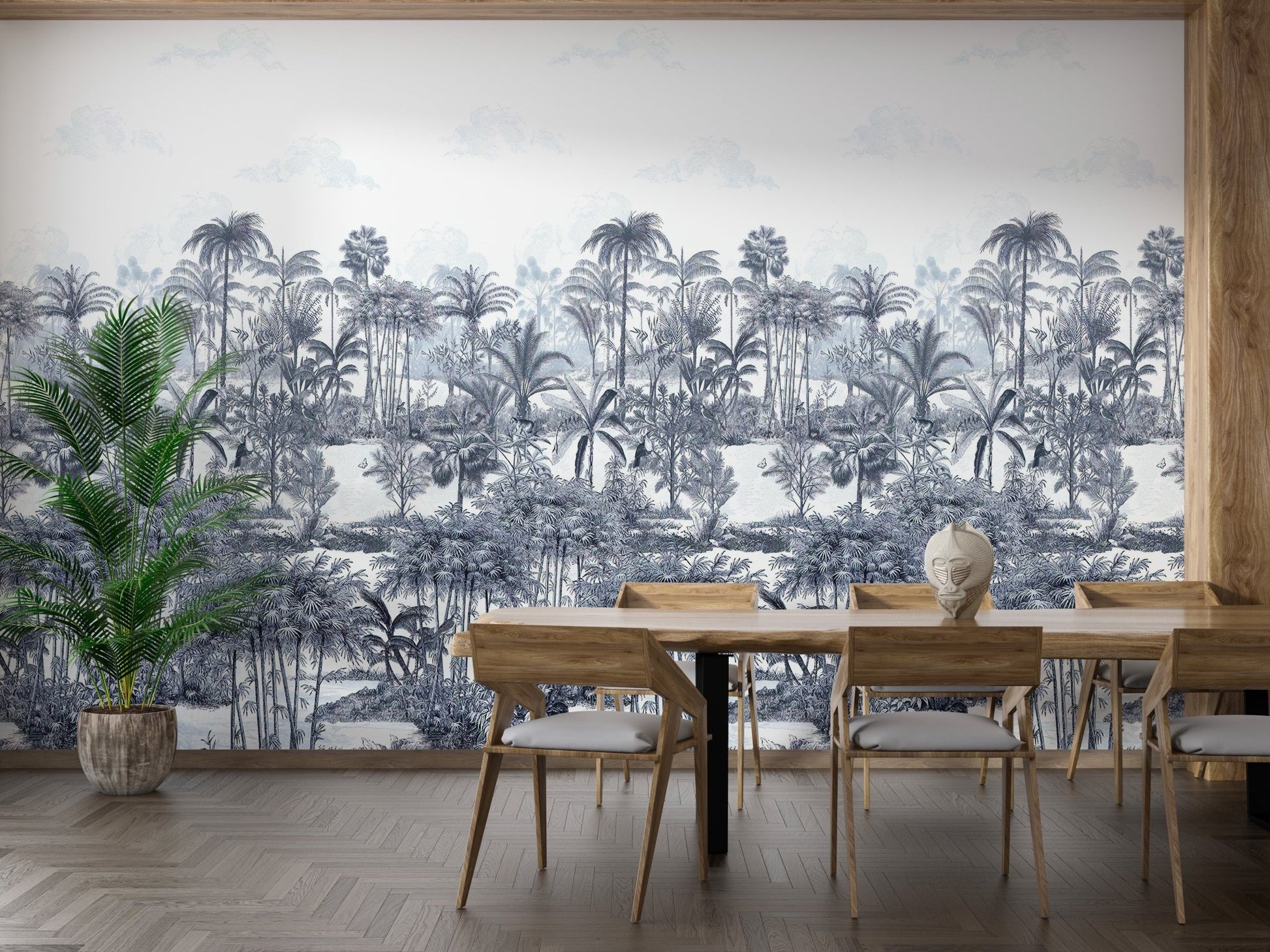 Blue botanical wall mural behind a wooden dining table and chairs