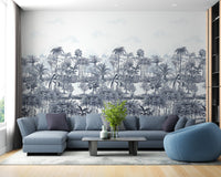 Tropical Forest Blue Wall mural in a living area with a blue sofa.