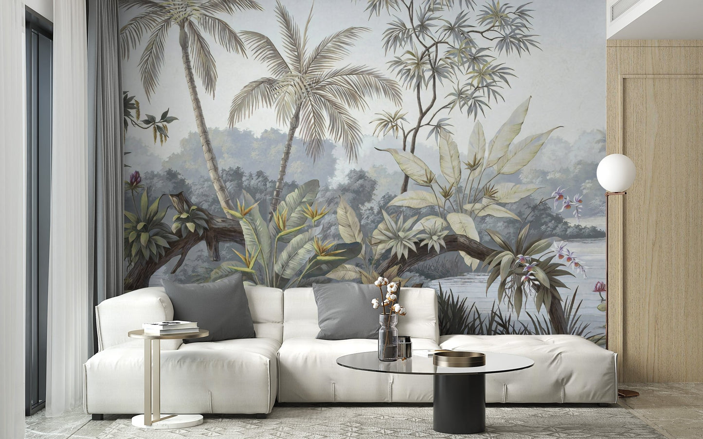 Contemporary living with a white modular sofa and jungle leaf wall mural.