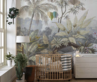 Neutral nursery featuring a tropical palm tree wall mural behind a wooden crib.