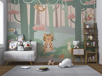 Pastel green forest wall mural with pink cloud patterns in kids play area.