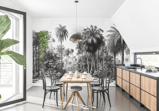 Dining room with Tropical Gray Forest Wall mural and wooden table with black chairs.