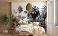 Bedroom with a wooden bed frame and a large Tropical Gray Forest Wall mural.