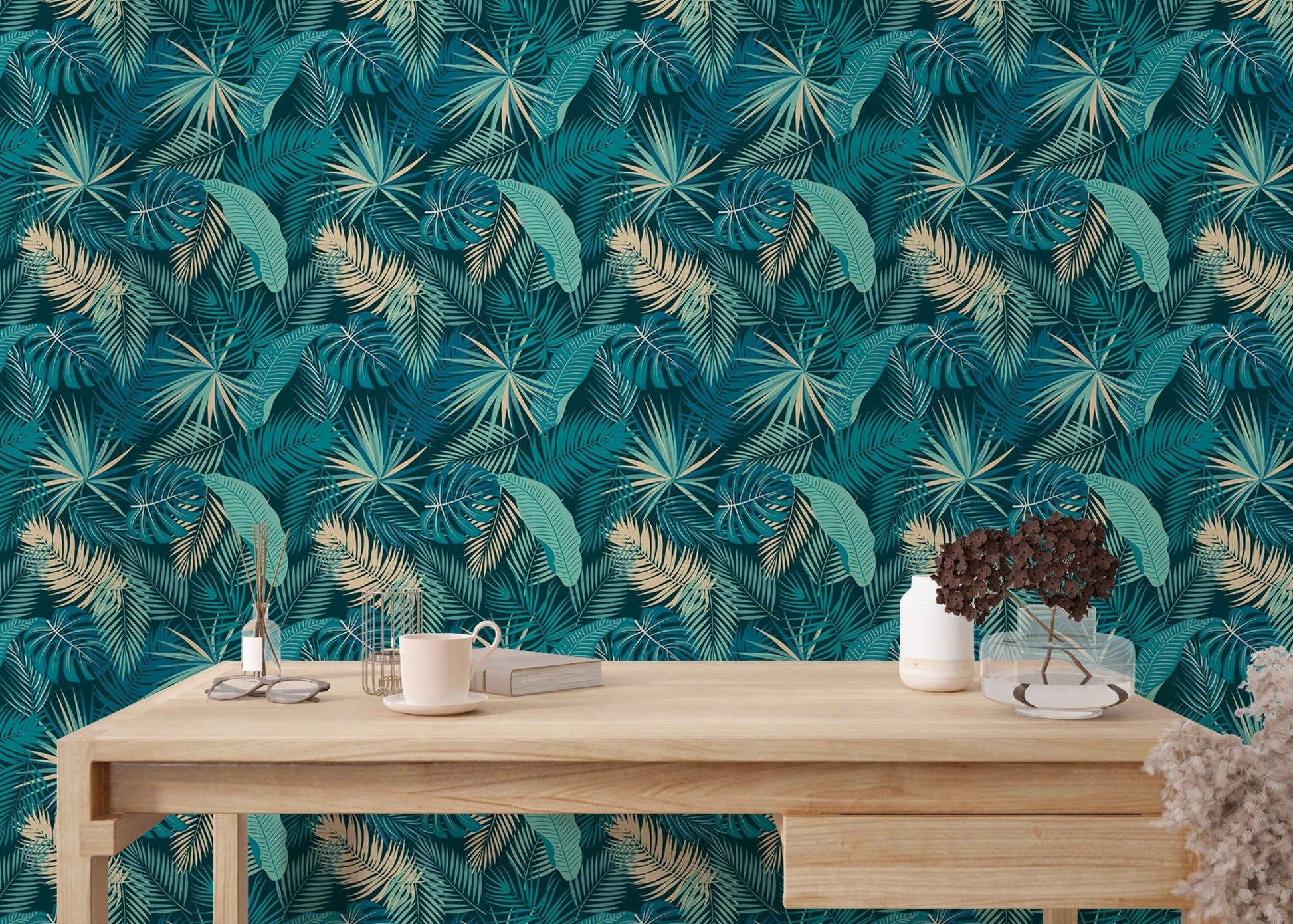 Teal jungle wallpaper in minimalist reading room with wooden table.