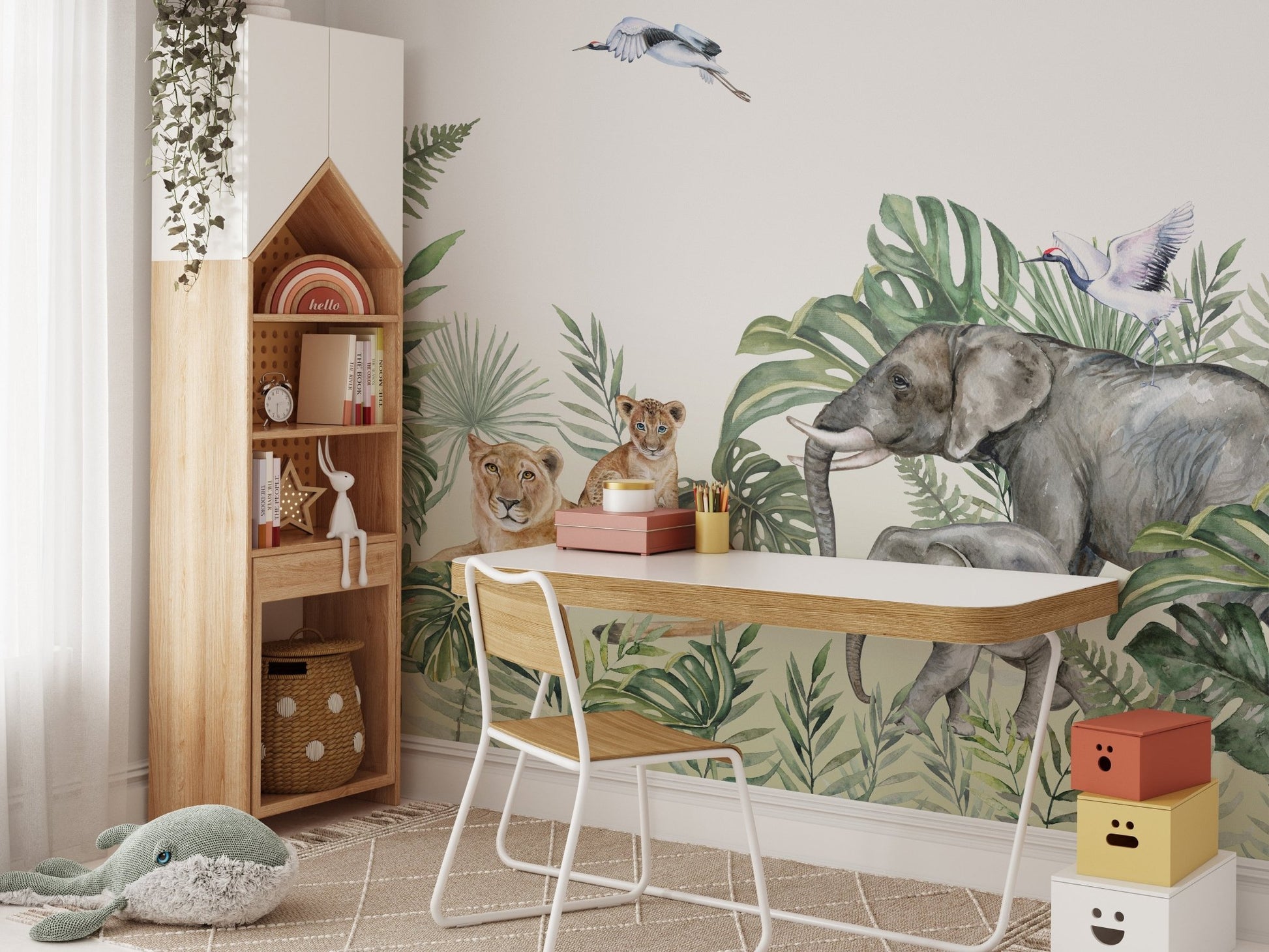 Jungle Safari themed wall mural for a study area with a white desk and green plants.