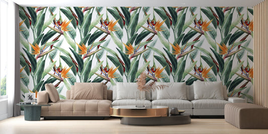 Bright green watercolor jungle wall mural behind a sofa