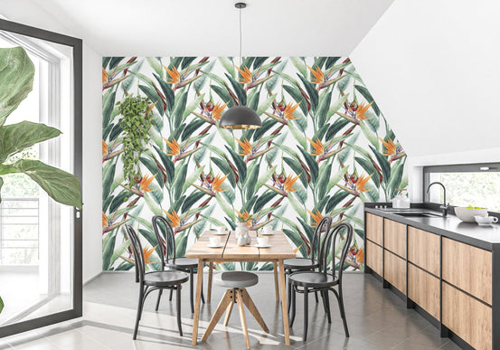 Dining room wall decorated with lush tropical watercolor wallpaper