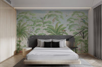Vintage style jungle scenery wall mural with pink floral accents in bedroom.