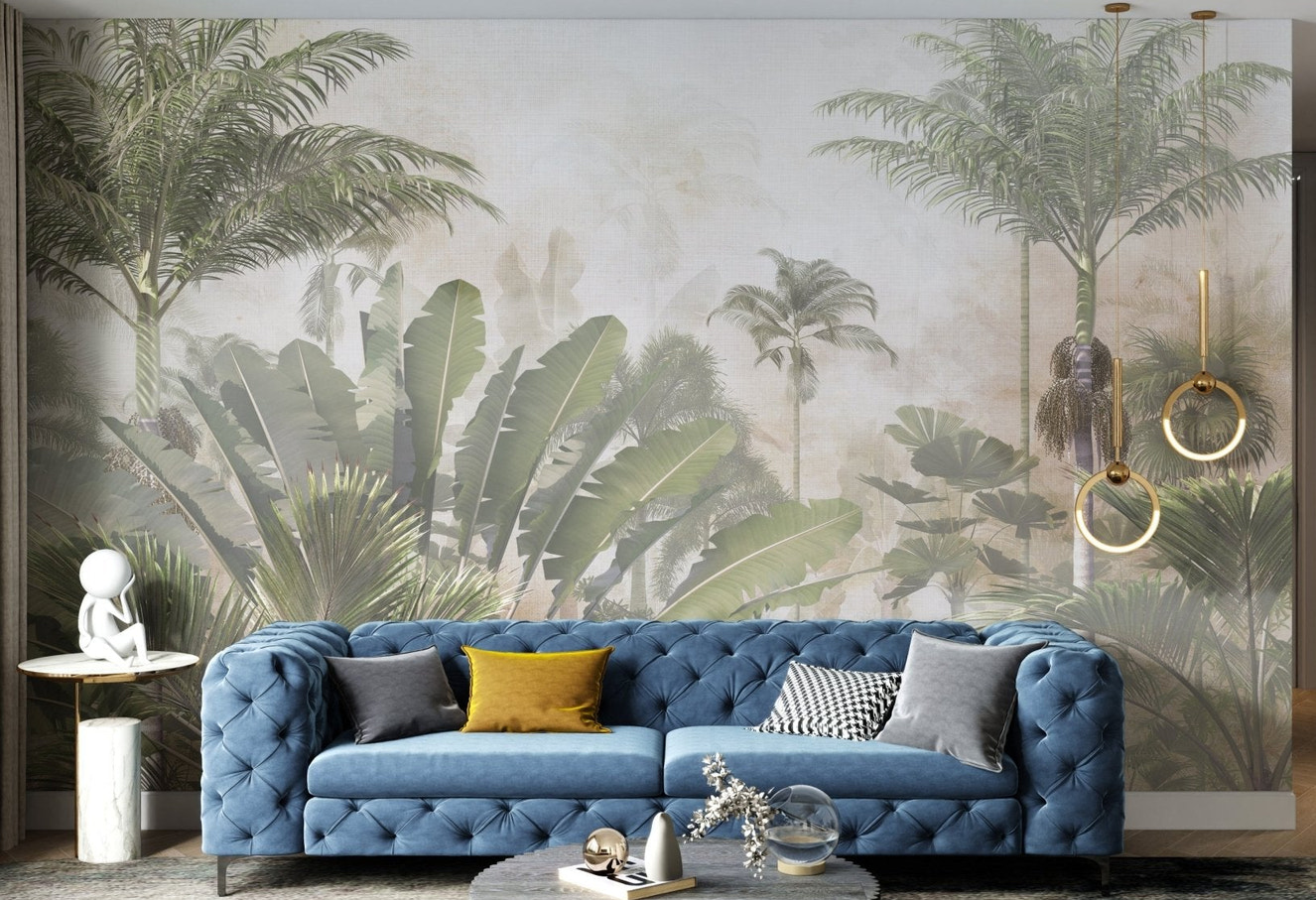 Palm tree and plant wall mural in soft green tones for living area.