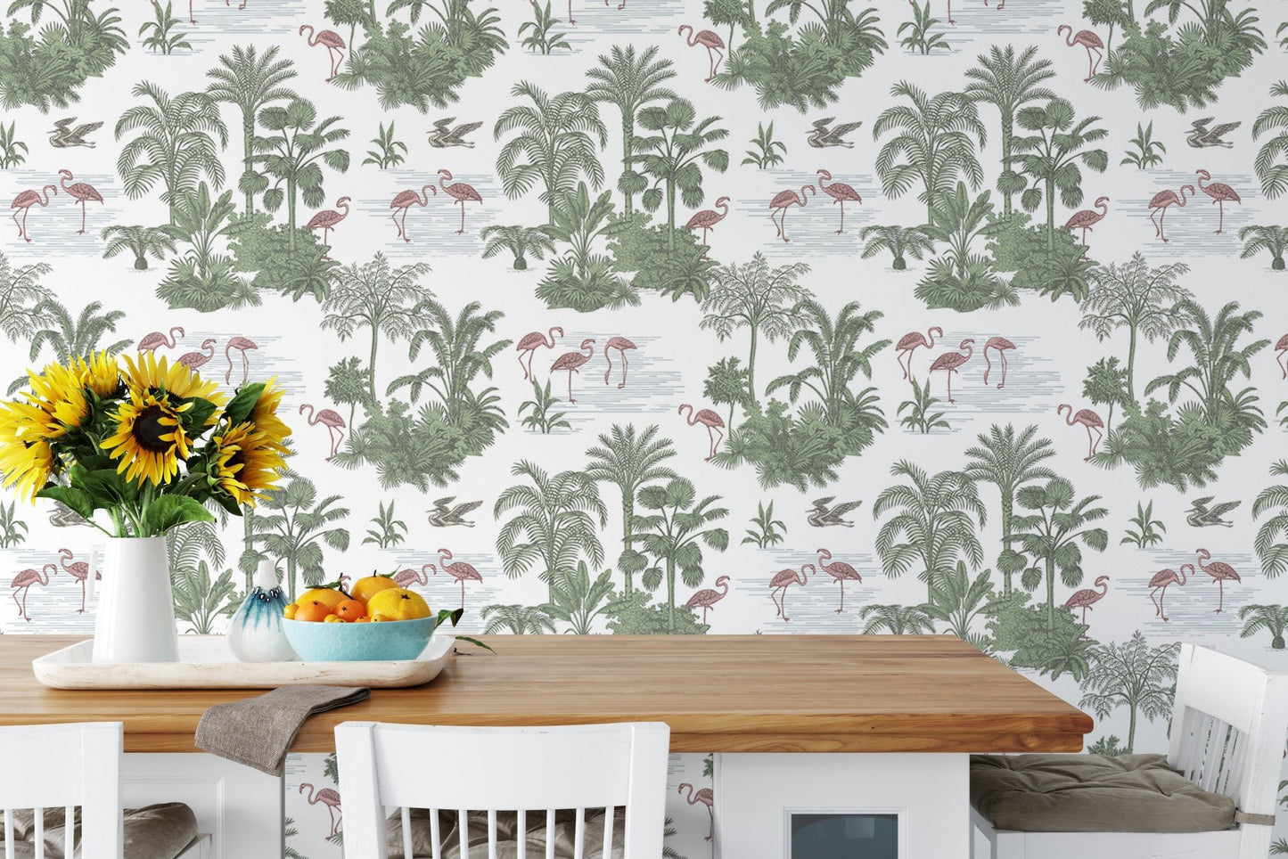 Jungle themed wallpaper in a dining room with wooden table and sunflowers.