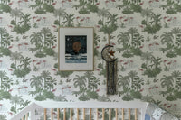 Tropical Palm Trees Flamingo Jungle Toile Wallpaper in a nursery with a white crib.
