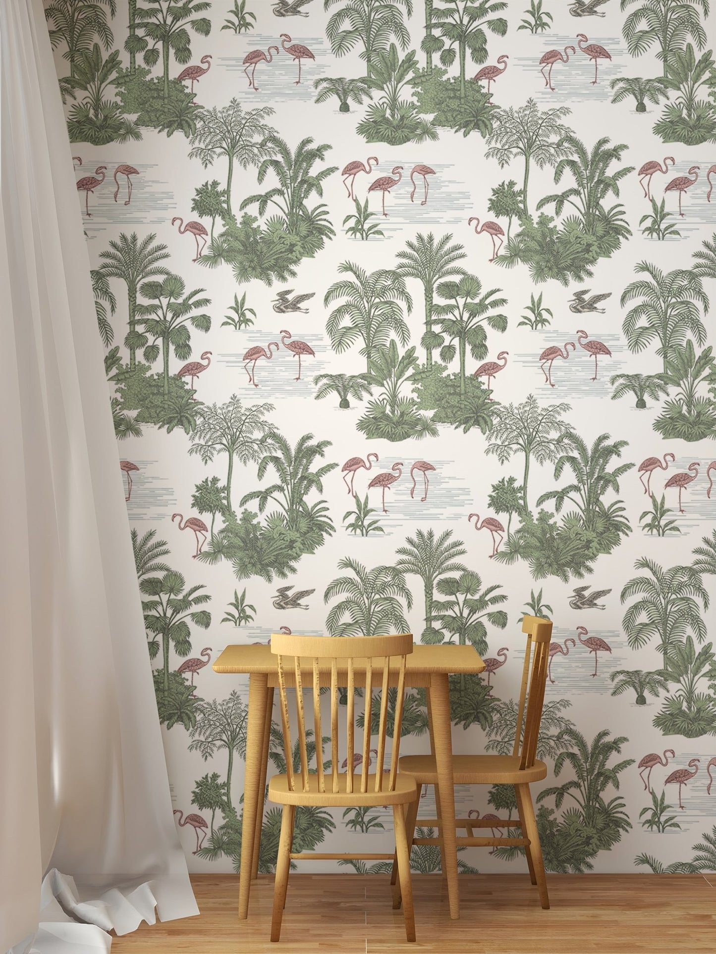 Green toile wallpaper behind a small wooden dining table and two chairs.