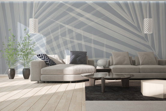 Minimal tropical wall mural in light blue with abstract leaf lines.