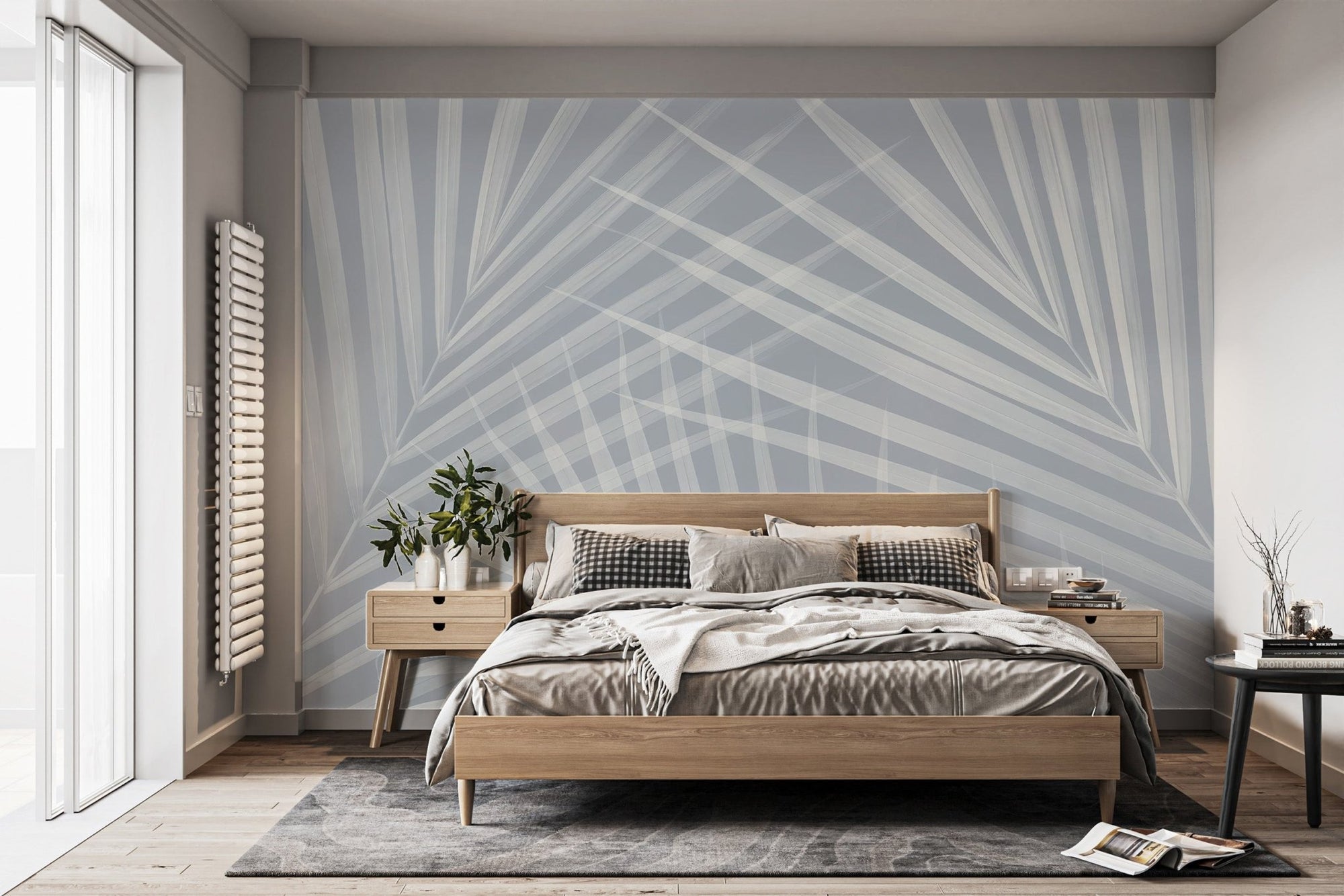 Tropical paradise light blue mural with soft palm leaf wallpaper design.