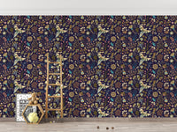 Patterned botanical plants wallpaper in a child’s playroom with wooden toys.