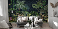 Grey sofa set against a dense green tropical rainforest wall mural in a modern home.