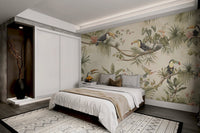 Bedroom wall mural with monstera leaves and tropical birds in earthy tone.