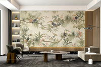 Floral jungle wall mural with peach hibiscus and green tropical foliage.