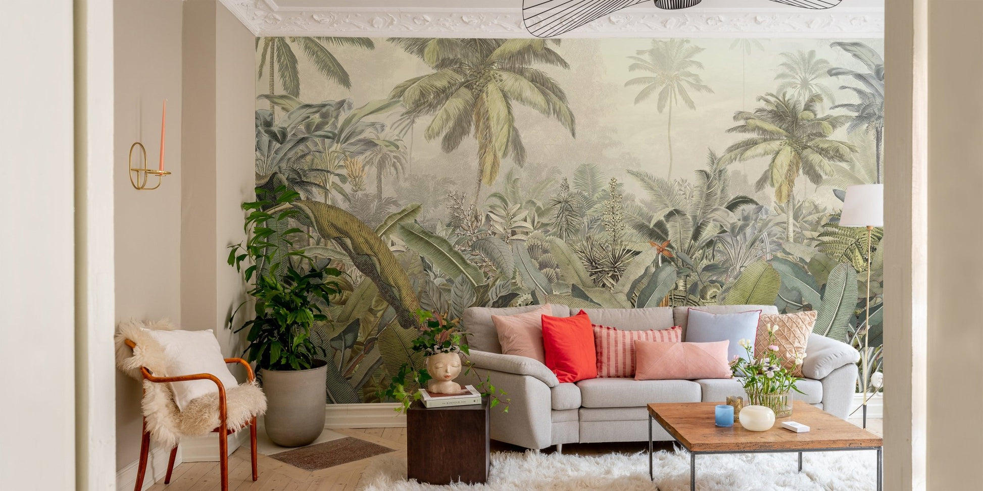 Lush green botanical wall mural in contemporary living area with wooden floor.