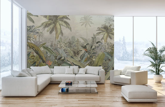 Palm tree canopy wall mural behind white sectional sofa in bright living area.