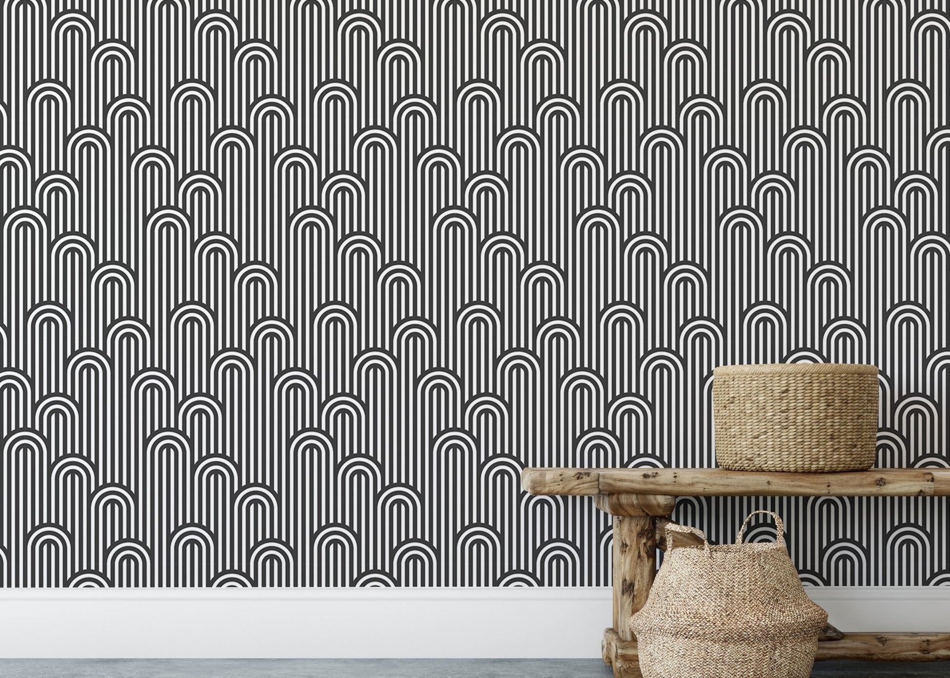 Stripy weaving black and white wallpaper behind a rustic wooden bench