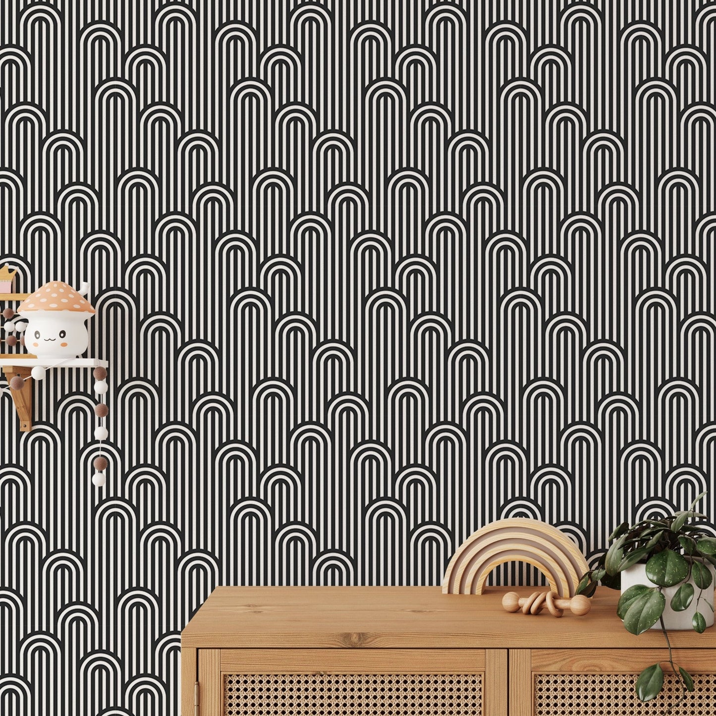Black and white stripy weaving wallpaper above a wooden sideboard