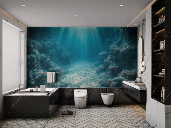 Underwater coral reef wallpaper featuring sunbeams piercing through deep blue water.