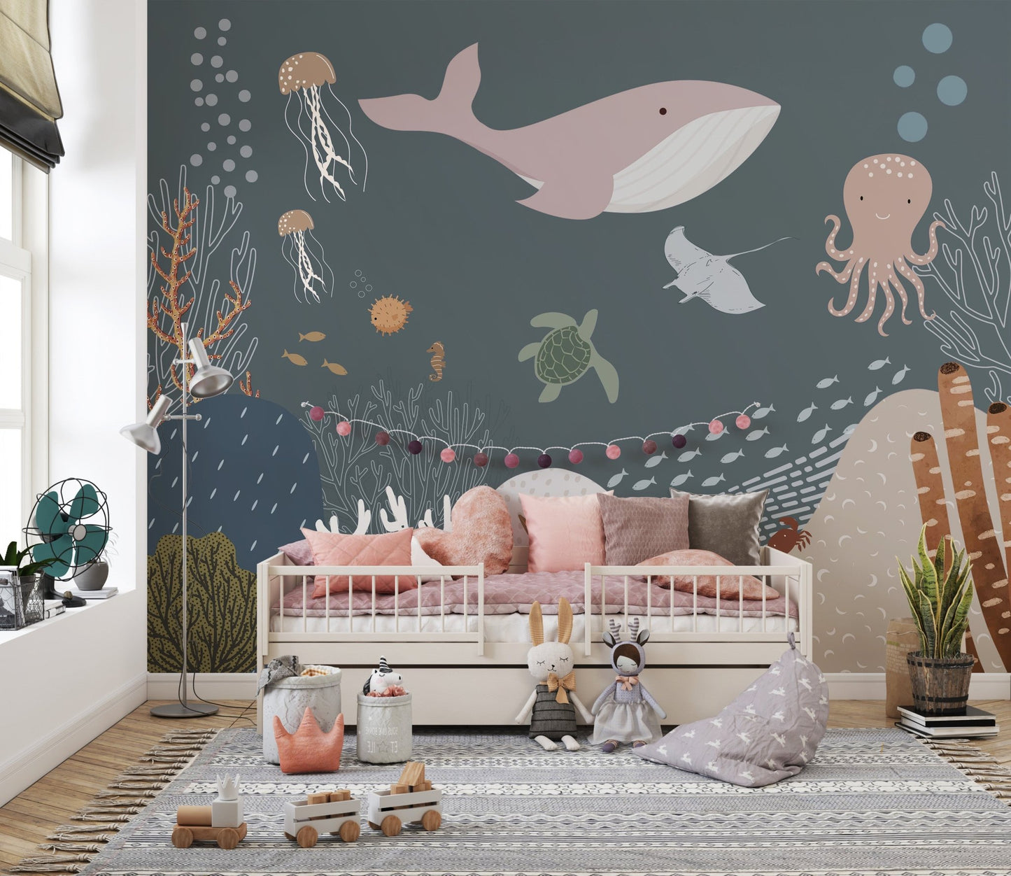 Soft watercolor fish and underwater plants mural for kids playroom walls.
