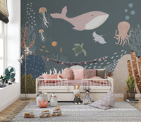 Soft watercolor fish and underwater plants mural for kids playroom walls.
