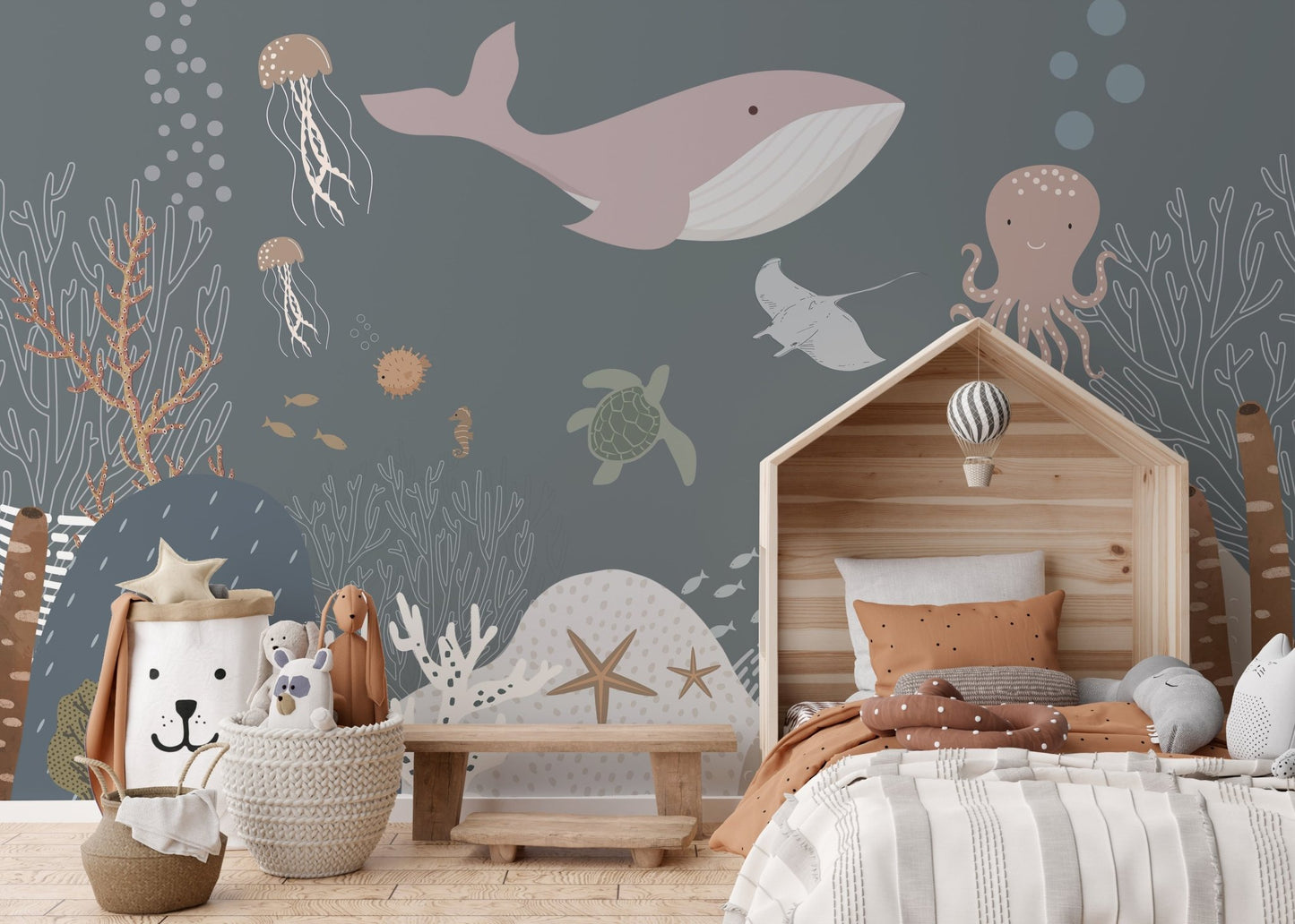 Playful ocean creatures in a colorful underwater scene for kids bedroom.
