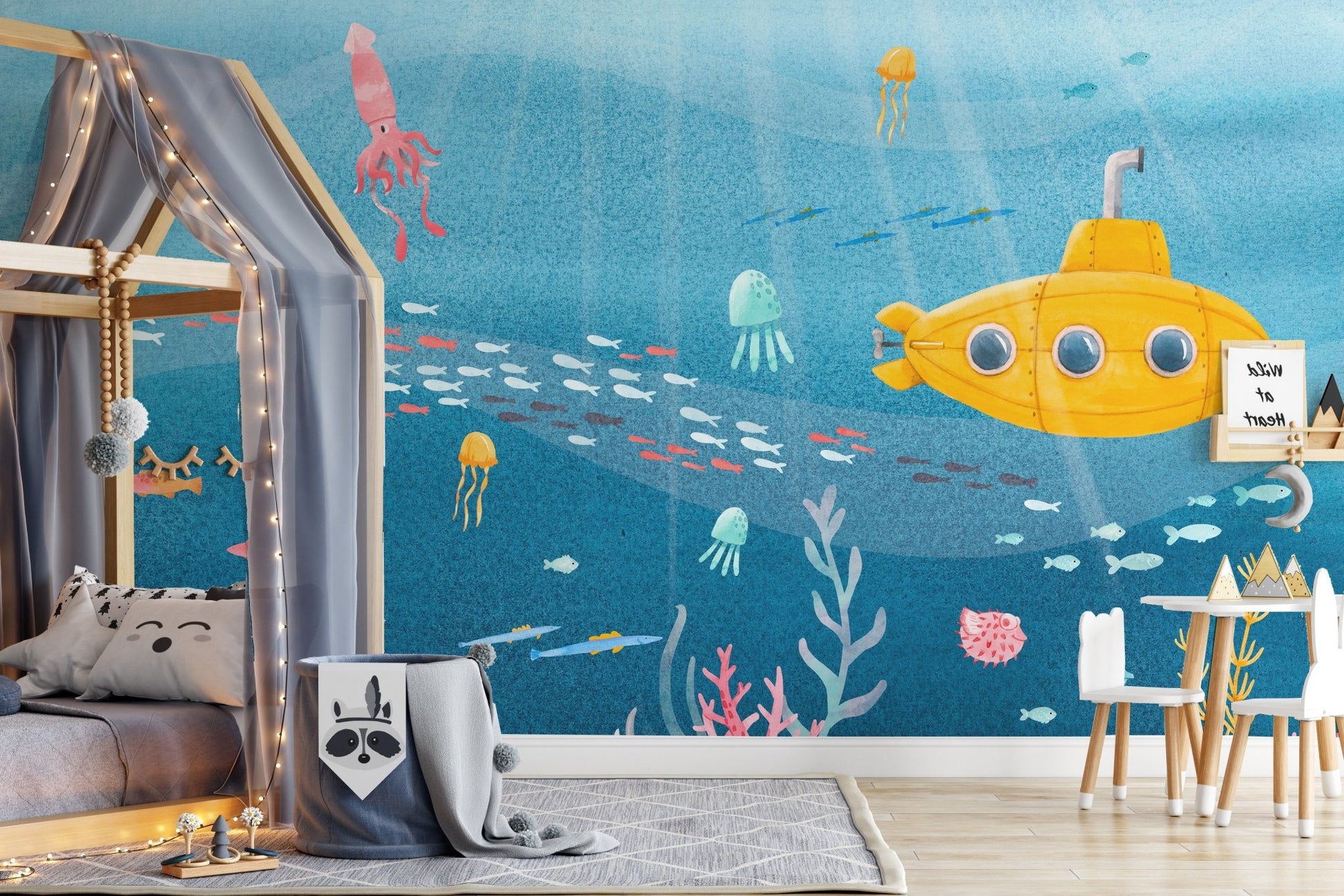 Ocean-inspired sea life mural creating a serene marine scene in toddler room.
