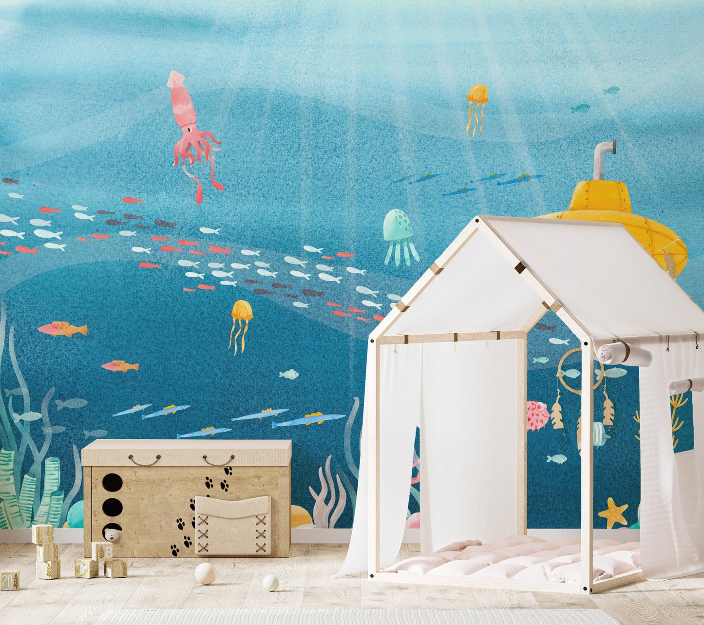 Underwater mural showcasing diverse sea life and coral reefs in nursery.
