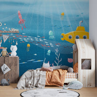 Dynamic sea life wall mural for ocean-inspired decor in children's bedroom.

